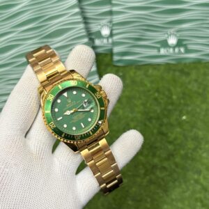 Rolex Submariner – Superlative Chronometer Officially Certified – Gold Green Ton